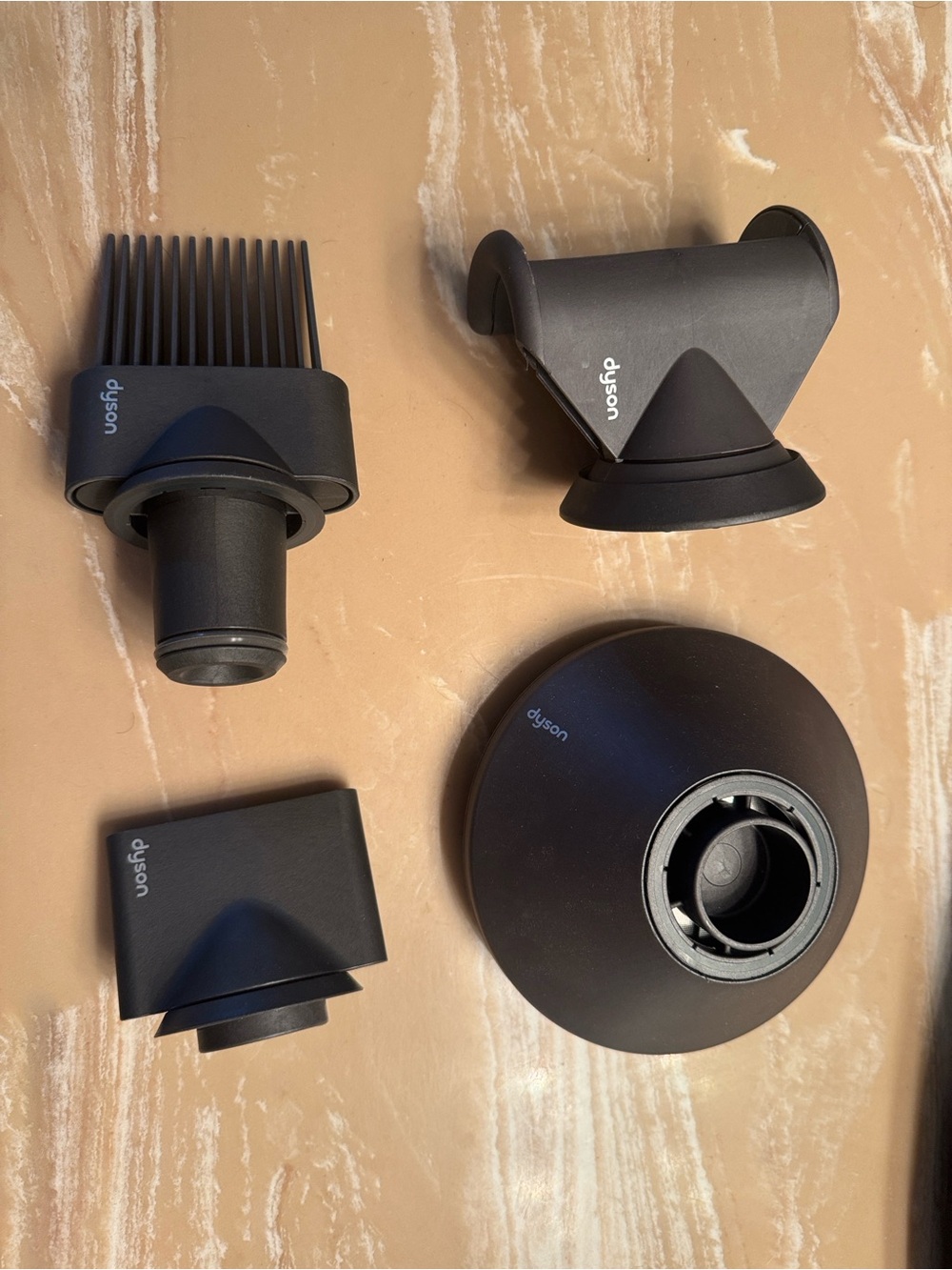 Four Dyson attachments for you hair dryer - all new without box